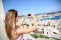 Young woman taking photos of town Royalty Free Stock Photo