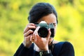 Young woman taking a picture Royalty Free Stock Photo