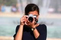 Young woman taking a picture Royalty Free Stock Photo