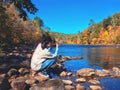 A young woman taking pictures of the autumn views Royalty Free Stock Photo