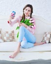 Young woman taking selfie with her mobile phone Royalty Free Stock Photo