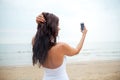 Young woman taking selfie with smartphone Royalty Free Stock Photo