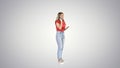 Young woman talking on mobile phone on gradient background. Royalty Free Stock Photo