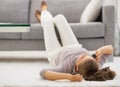 Young woman talking mobile phone while laying on floor Royalty Free Stock Photo