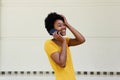 Young woman talking on mobile phone and smiling Royalty Free Stock Photo