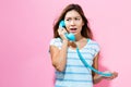 Young woman talking on old fashion phone Royalty Free Stock Photo