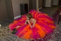 Young Woman Talking on Phone Lying on Ground Royalty Free Stock Photo