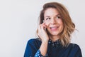 Young woman talking on a phone