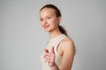 Young Woman in Tank Top Pointing at Camera