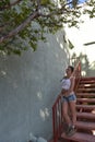 Young woman in tank top and shorts Royalty Free Stock Photo