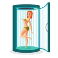 Young woman tanning in vertical solarium