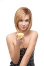 Young woman tasting a lemon Royalty Free Stock Photo