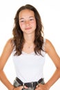 Young woman teen girl laughing smiling looking in empty mockup shirt over white wall background Royalty Free Stock Photo