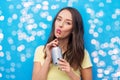 young woman or teenage girl drinking soda from can Royalty Free Stock Photo