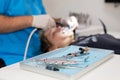 young woman or teenage girl having braces fitted at dentist Royalty Free Stock Photo