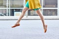 Young woman or teenage girl legs on city street Royalty Free Stock Photo