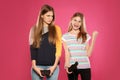 Young woman and teenage girl playing video games Royalty Free Stock Photo