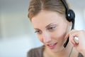 Young woman teleoperator at work Royalty Free Stock Photo