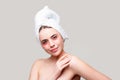Young woman in terry towel use patch. Sexy woman applying eye patches. Close up portrait girl with towel on head. Eyes