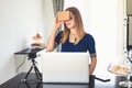 Young woman testing a low cost virtual reality glasses