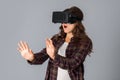 Young woman testing virtual reality helmet Royalty Free Stock Photo