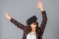 Young woman testing a virtual reality helmet Royalty Free Stock Photo