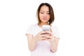 Young woman text messaging on mobile phone Royalty Free Stock Photo