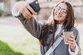 Young woman texting or using smartphone