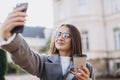 Young woman texting or using smartphone