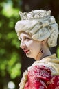 Young woman in 18th century suit.