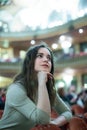 Young woman theatre goer looking at play Royalty Free Stock Photo