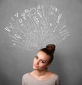 Young woman thinking with sketched arrows above her head Royalty Free Stock Photo