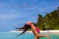 A young woman throwing back her hair Royalty Free Stock Photo