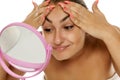 Woman tightening her face Royalty Free Stock Photo