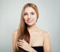 Young woman touching her hand her hair. Perfect girl with natural healthy hair and clear skin portrait Royalty Free Stock Photo