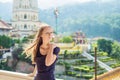 Young woman tourist in Buddhist temple Kek Lok Si in Penang, Malaysia, Georgetown Royalty Free Stock Photo