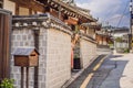 Young woman tourist in Bukchon Hanok Village is one of the famous place for Korean traditional houses have been Royalty Free Stock Photo