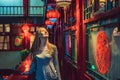 Young woman tourist looks at the Chinese traditional lanterns. Chinese New Year. Travel to China concept BANNER, LONG Royalty Free Stock Photo