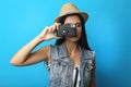 Young woman tourist making photo