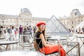 Woman visiting Louvre in Paris