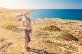 Young woman tourist, Cyprus Ayia Napa, Cape Greco peninsula, national forest park Royalty Free Stock Photo