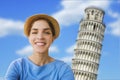 A young woman tourist is taking a selfie picture in front of the campanile tower of Pisa, in Italy, Europe. Royalty Free Stock Photo