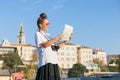 young woman tourist visiting Belgrade, Serbia looking at the map Royalty Free Stock Photo