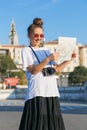 Young woman tourist visiting Belgrade, Serbia looking at the map Royalty Free Stock Photo