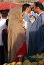 Kabul, Afghanistan: A young woman in traditional dress at Kabul market
