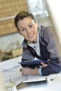 Young woman trainee in carpentry at work Royalty Free Stock Photo