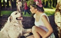Young woman training her dog Royalty Free Stock Photo