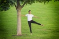 Young woman training in nature