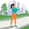 Young woman in training stretching with the city building background