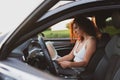 Young woman travel the roads in a car, look at the map Vacation concept Royalty Free Stock Photo